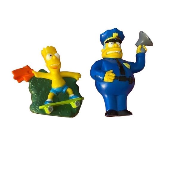 Simpsons lot of two Burt Simpson skateboarding chief Wiggum police 2007 - Picture 1 of 3